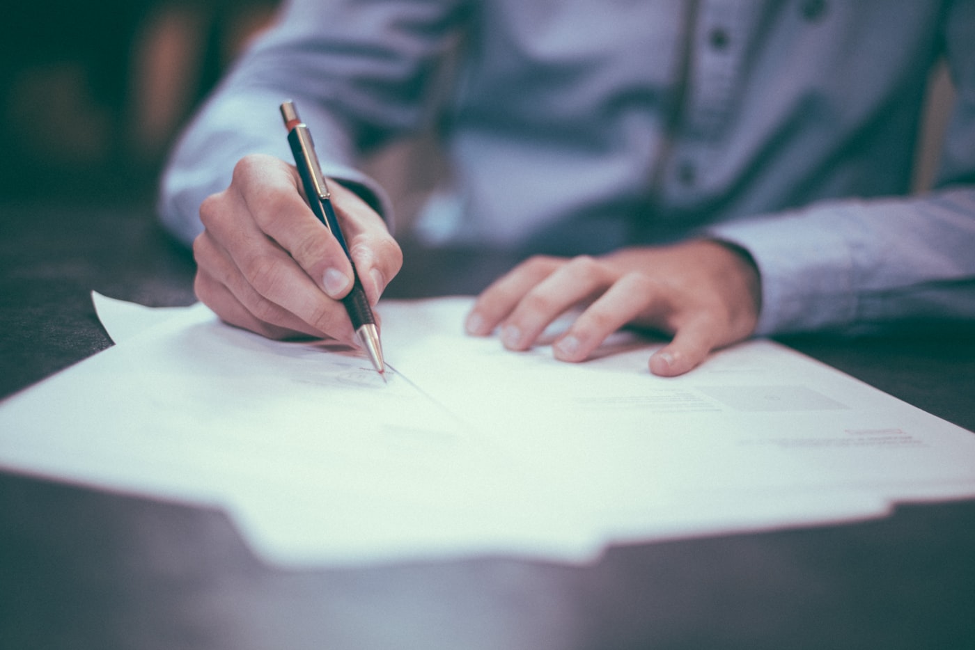 Regulatory documents and notes on a desk